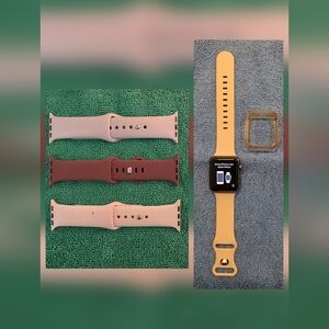 Apple watch 7000 series 38mm Silver With 4 New Bands Charge        Cord